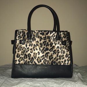 Brand new cheetah print purse.